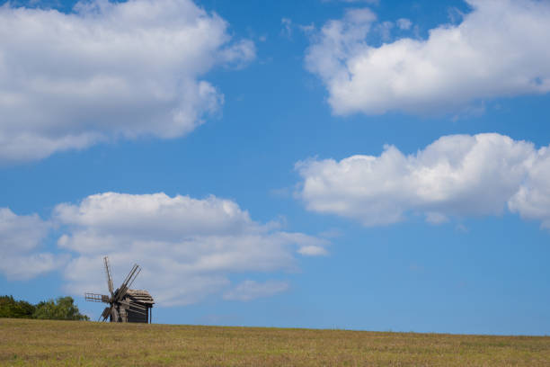 istock Landscape with windmill against the blue sky 638574092