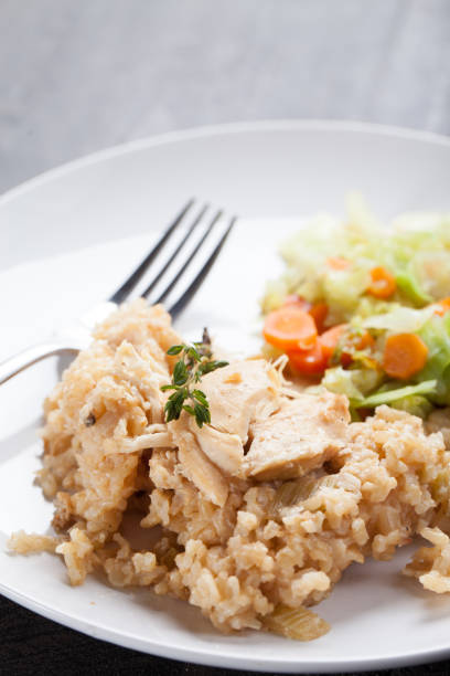 istock Lemon Pepper Chicken With Vegetables vertical shot 638574308