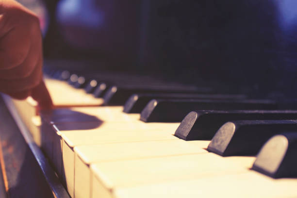 istock Pressing keys of piano 638577874