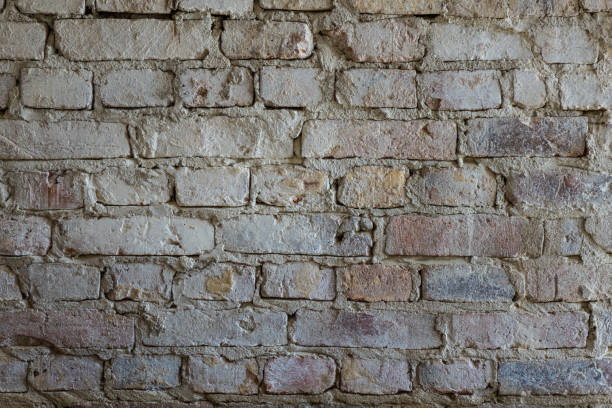 istock The old and vintage brick wall in a room 638579248