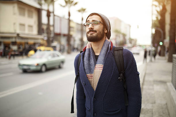 istock Man Waiting Taxi 638581680