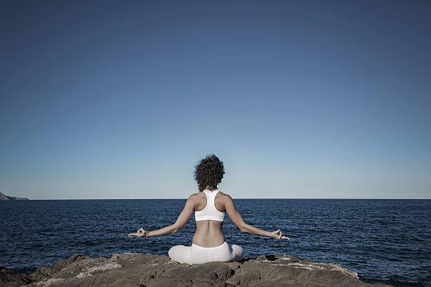 istock Yoga practice at the sea 638583552