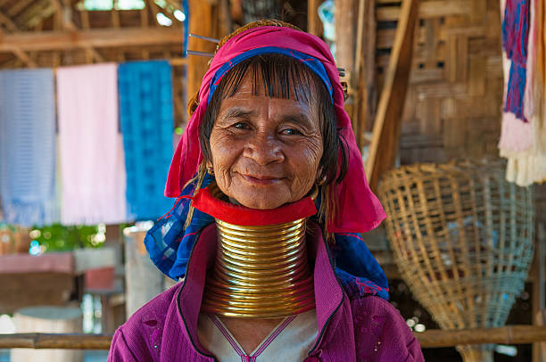 Mae Hong Son, Thailand - December 31, 2011: Smiling long neck or Paduang woman, which are part of the Karen tribe.