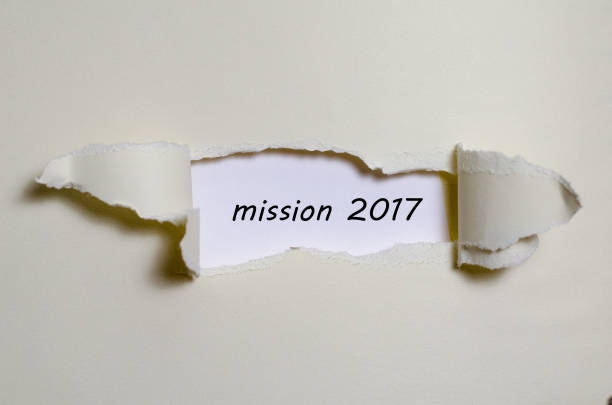 istock The word mission 2017 appearing behind torn paper 638586048