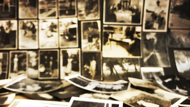 istock Old Photos in Piles and on Pages Defocused 638586626