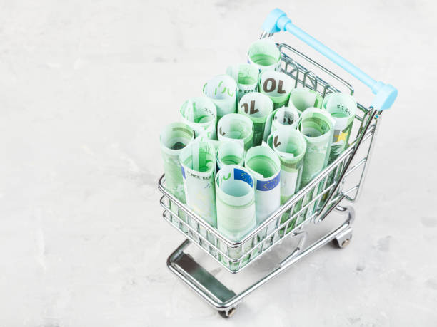 istock trolley with euro banknotes on concrete board 638587002
