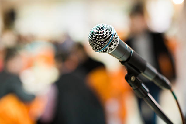 istock microphone in concert hall, conference or stage 638587348