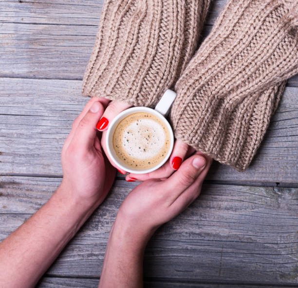 istock Woman holding coffee 638591344
