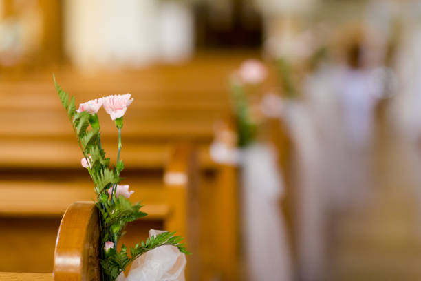 Christian detaill - church decoration for wedding marriage ceremony. Romantic floral concept.