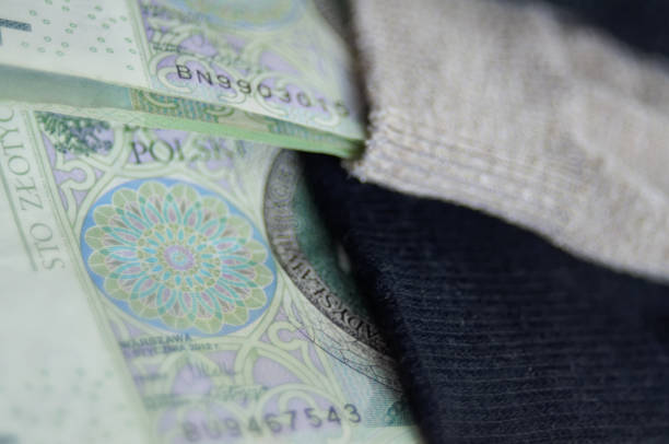 istock Money t t tipped in socks 638594196