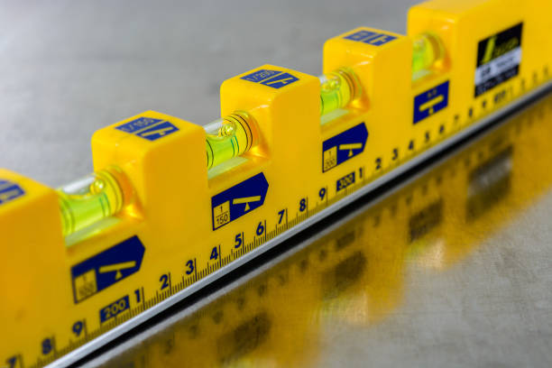 istock yellow construction level on stainless steel background 638595680