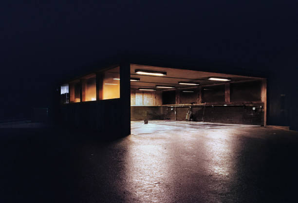istock Desolate car wash shelter at night 638595772