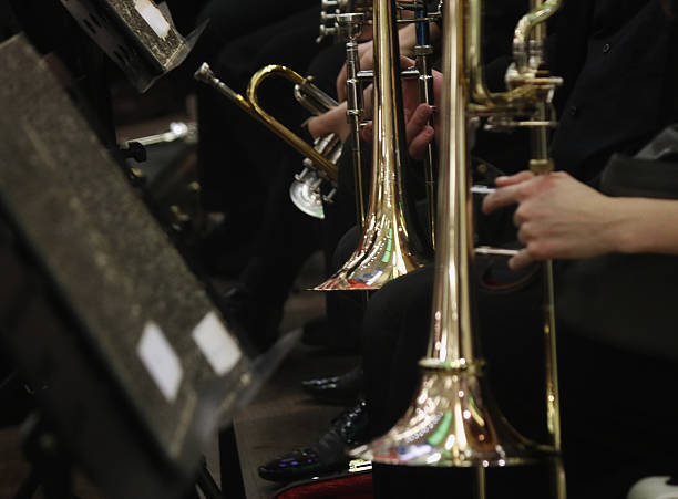 istock Trombone players in orchestra 638598610