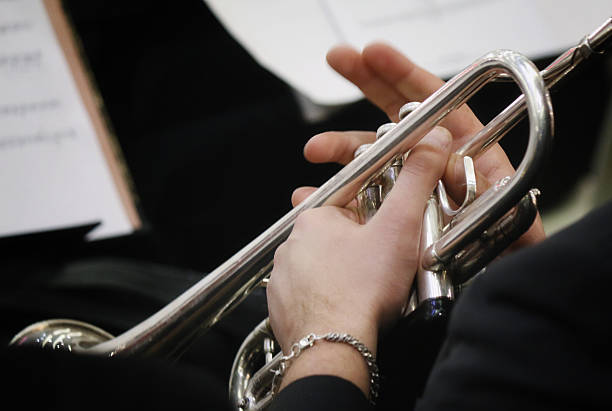 istock Trumpet player in orchestra 638598652