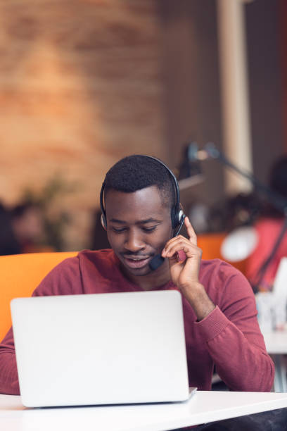 istock Customer Service agent in an startup office with laptop 638599370