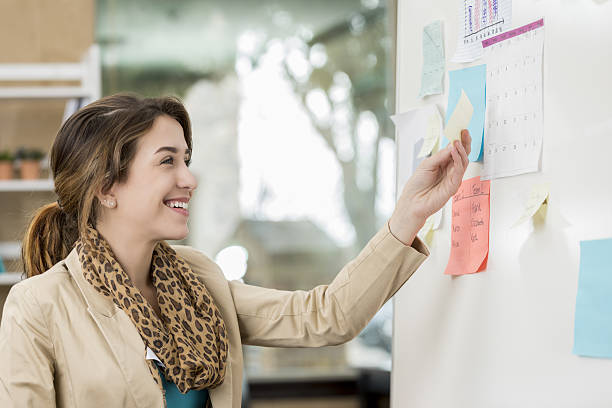 istock Confident business woman works on project 638602034