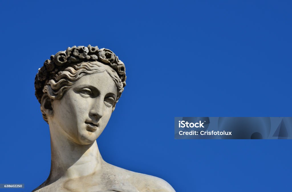 Classical goddess statue Ancient Roman or Greek goddess marble statue in People's Square in Rome, made in the 19th century (with copy space) Statue Stock Photo