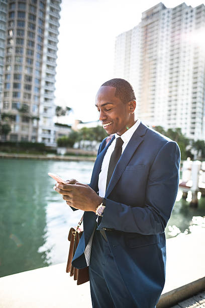 istock businessman texting in miami 638603210