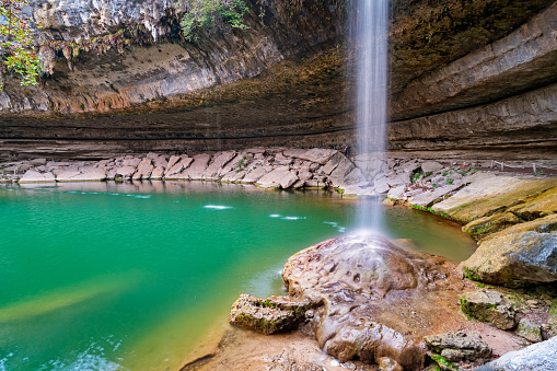 Stock photo of the jade green Hamilton Pool and waterfall located near Austin, Texas, USA.