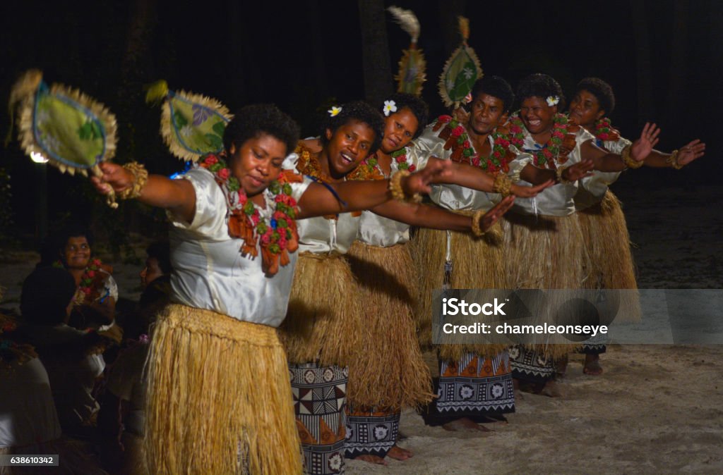 Fijian women dancing traditional female dance Meke the fan dan Fijian women dancing a traditional female dance Meke the fan dance. Real people copy space Fiji Stock Photo