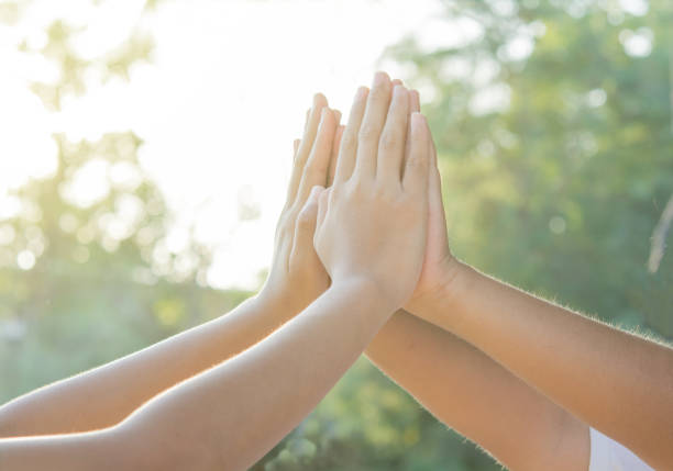 istock Join hands Sporting local children on playground 638610750