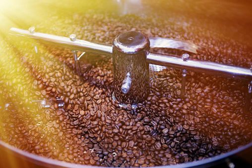Machine for roasting coffee close up .