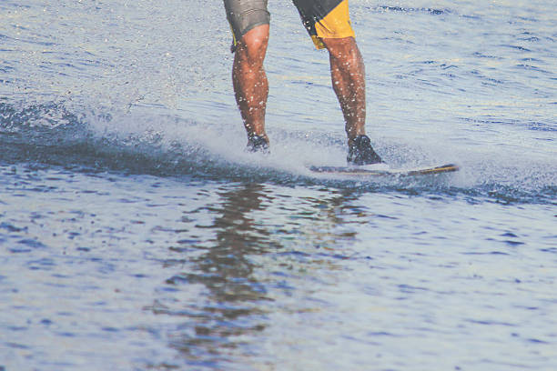 istock Young men surfing on the ocean 638613510