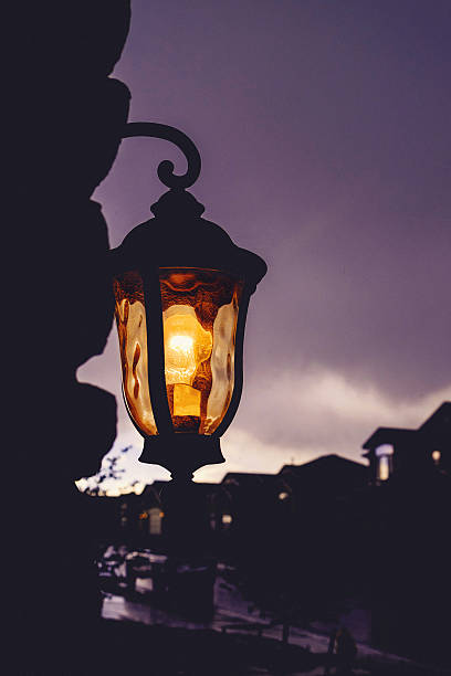 istock Outdoor light glowing under stormy skies 638615178