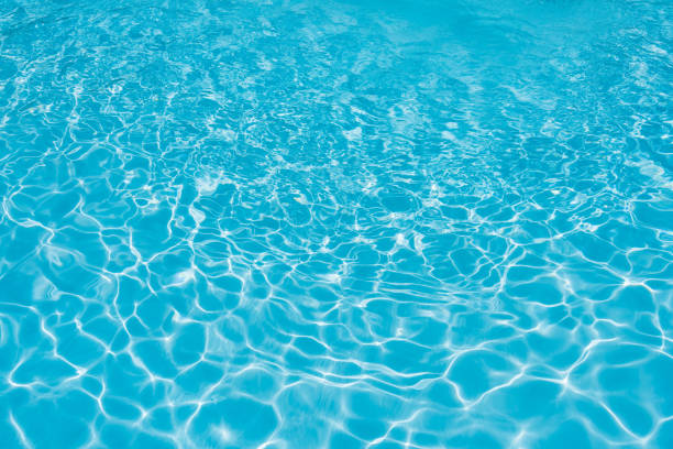 istock Blue and bright ripple water and surface in swimming pool 638618630