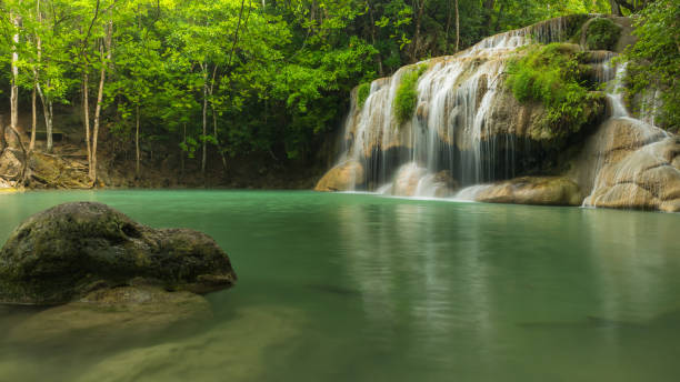 istock Beautiful and Breathtaking green waterfall, Erawan's waterfall 638618718