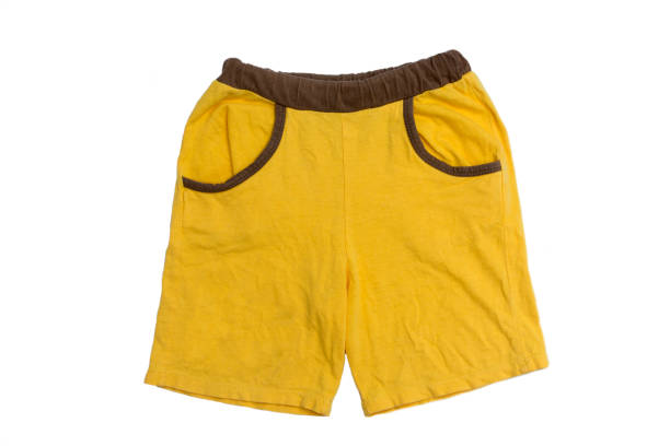istock Yellow Pants Kids on white background. 638620350
