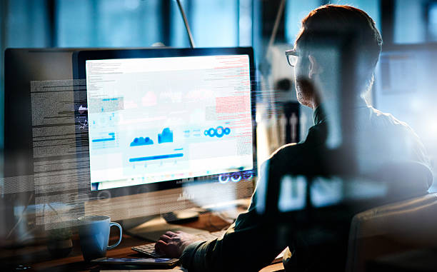 Concentrated on the code Cropped shot of a male computer programmer working on new code Technical Expertise stock pictures, royalty-free photos & images