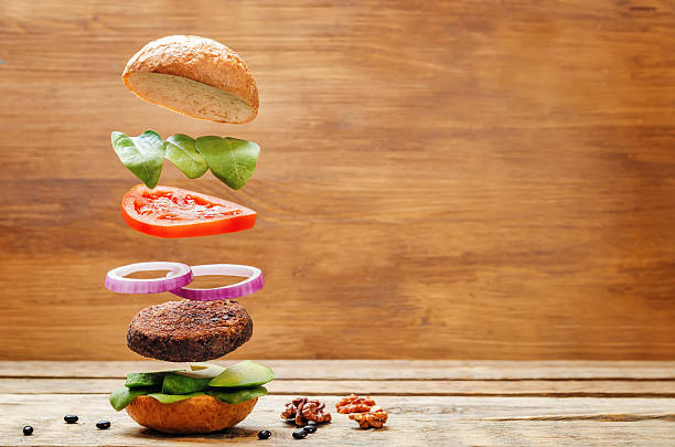 istock Flying vegan black bean mushrooms burger 638623454