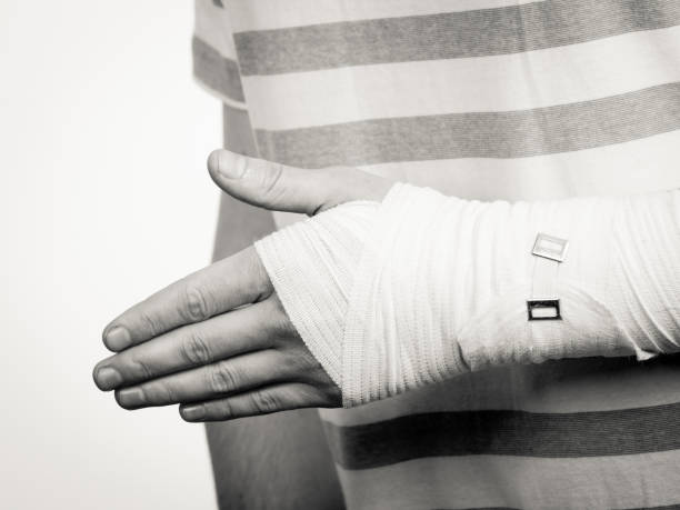 istock Part body man with bandaged hand. 638624374