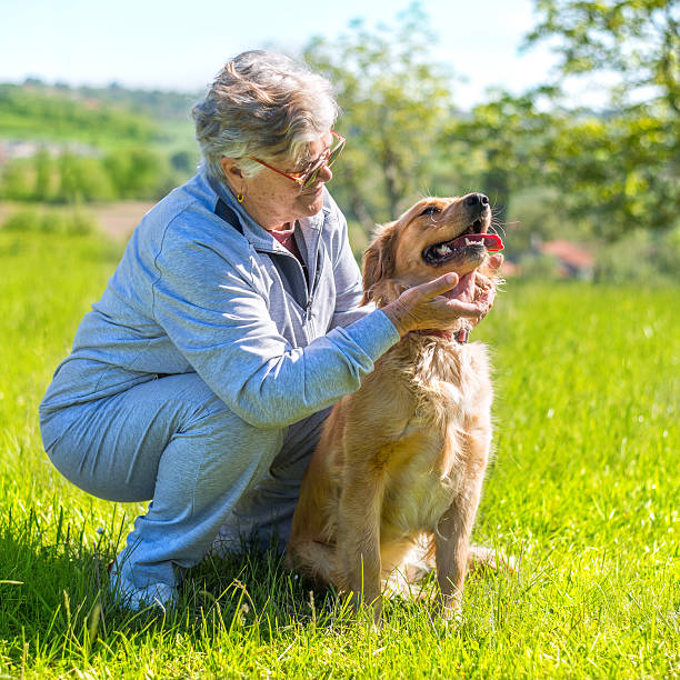 istock Senior woman and her dog 638626622