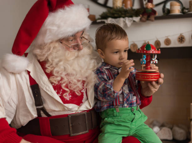 istock Santa Claus with Child 638626888
