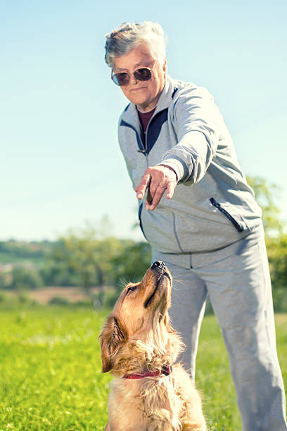 istock Senior woman and her dog 638627008