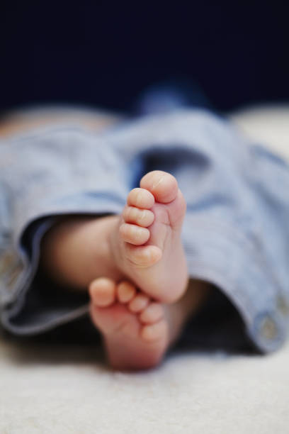 istock bare feet of newborn baby 638628634