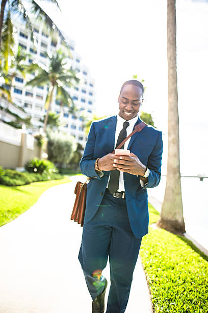 istock businessman texting in miami 638631458