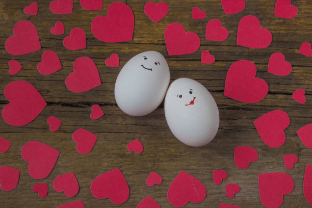 istock Unusual eggs in love with the muzzle and red hearts 638632728