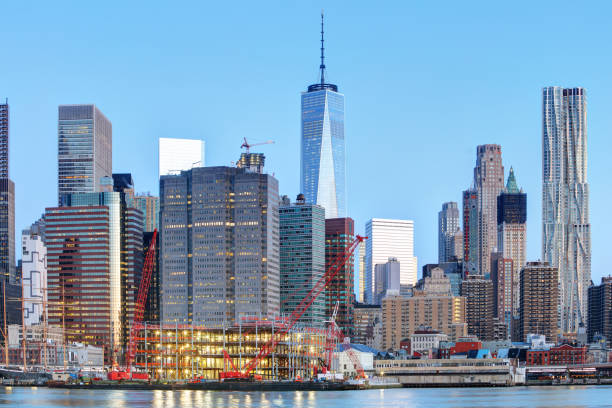 New York City at night with freedom tower New York City at night with freedom tower liberty tower stock pictures, royalty-free photos & images