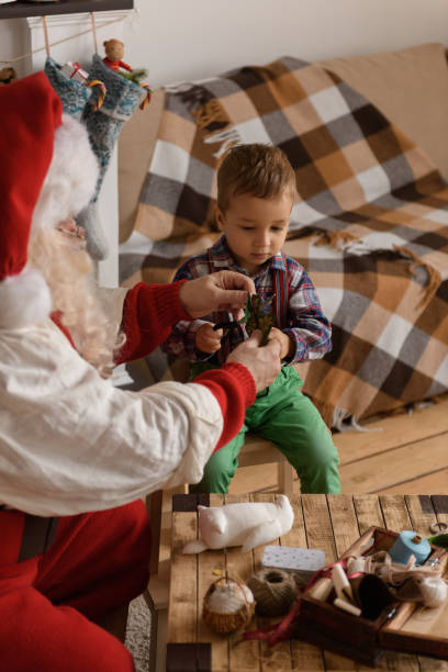 istock Santa Claus with Child 638636810