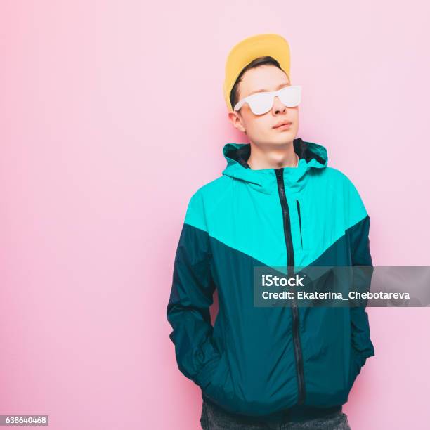 Man In A Yellow Baseball Cap Stock Photo - Download Image Now - Men, 1990-1999, Cool Attitude