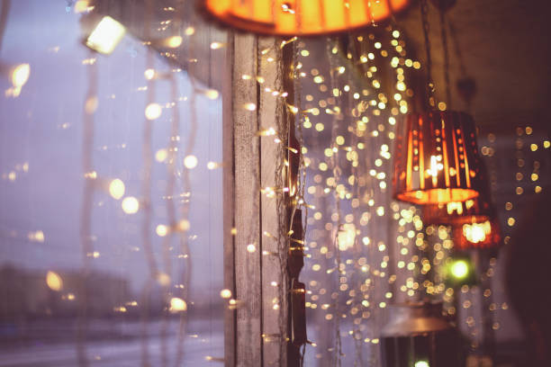 istock The window is decorated with Christmas garlands 638641396