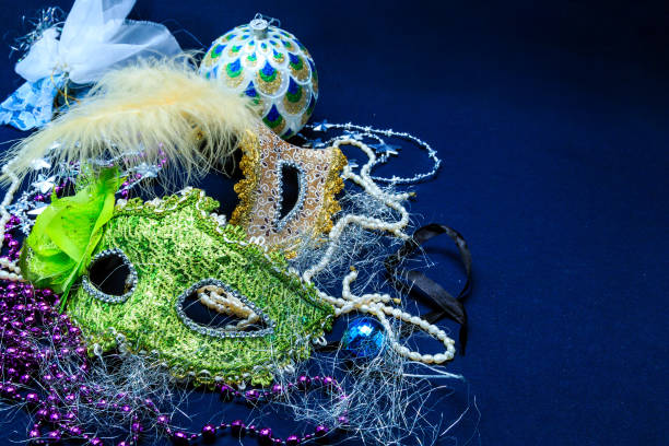 istock Theatrical masks with ornaments, a tinsel and a beads 638641574