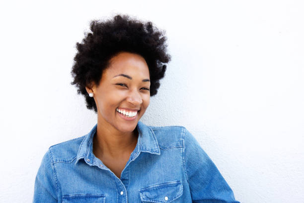 istock Cheerful woman smiling against white background 638641708