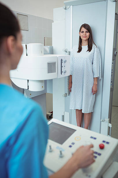 istock Female patient undergoing an x-ray test 638645908