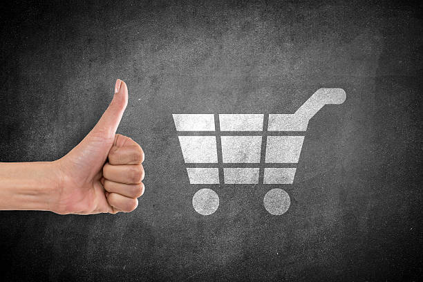 istock Shopping cart icon on blackboard 638651232