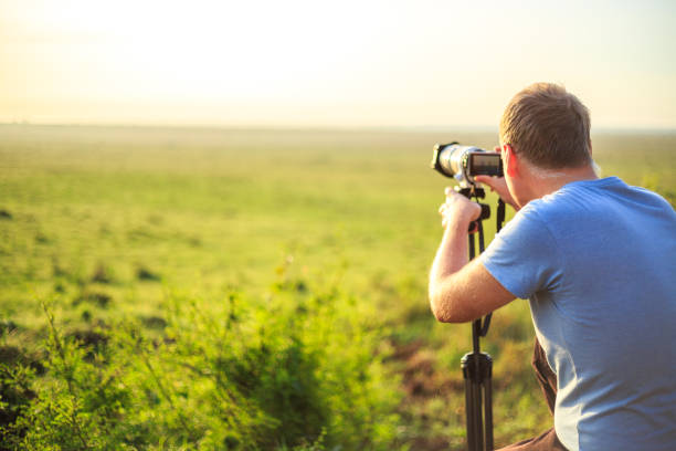 istock Professional photographer taking photo on savannah 638652628
