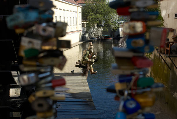 Love locks hang from a bridge in Prague representing secure friendship and romance